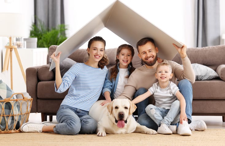 Young family with kids and dog